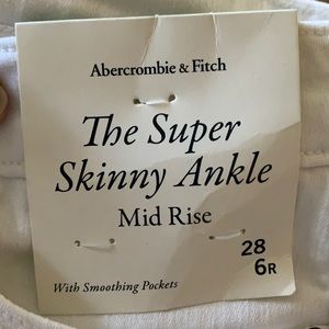 The Super Skinny Ankle Mid Rise Jeans